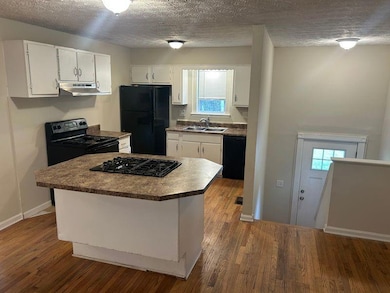 view into kitchen and front entry