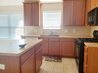 Island, gas stove, microwave, deep graphite sink, 