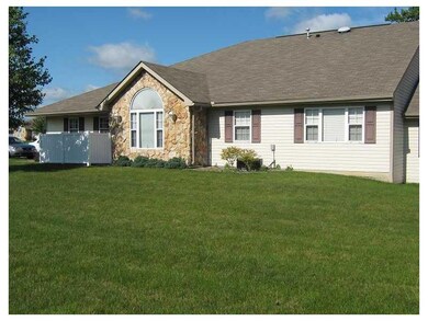 Exterior Front. Large lawn area with adult trees