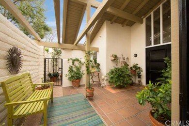 Front entry patio, with private gated patio off ma