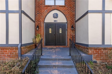 Property entrance with brick siding