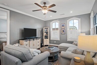 This open concept allows a great flow from living space to kitchen.   Don't miss the adorable windows throughout this unit and the beautiful plantation shutters.
