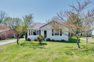 Welcome Home to 128 North St!  Completely renovated home - beautiful updates! Richland Park is within walking distance!  Outside features Metal Roof, Covered Front Porch, nice landscaping, Covered Deck on side to back, 15x19 One Car Garage/Workshop!