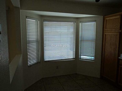 Property Photo. bay window in kitchen eating area.