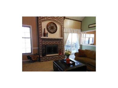 Great Room/Hearth Room adjoins kitchen.   Wood bur