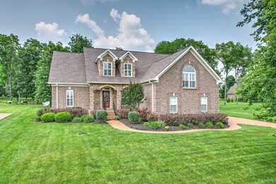 This beautiful home with brick and stone has recently had all the exterior trim painted and is freshened up for it’s new owner!