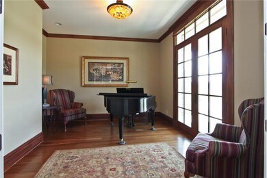 Living Room includes hardwood flooring and crown moulding