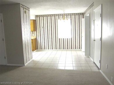 Living Room. VIEW  INTO THE KITCHEN