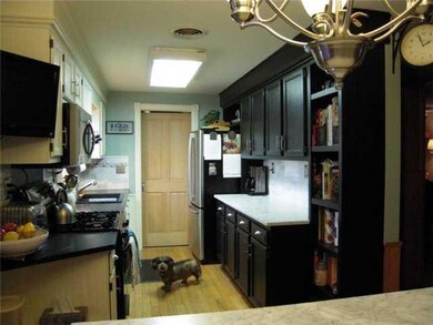 Kitchen. Updates include granite sink, marble and 