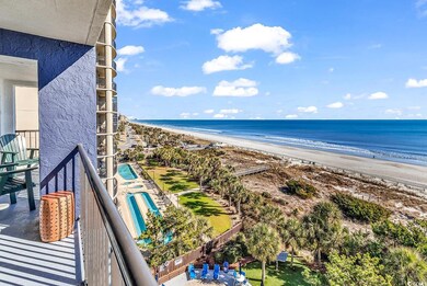 Property view of water featuring a beach view