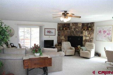 With Wood Burning Moss Rock Fireplace