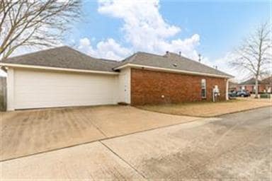 The carport has a garage door for complete privacy