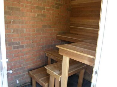 Sauna - with cedar walls and seats near pool