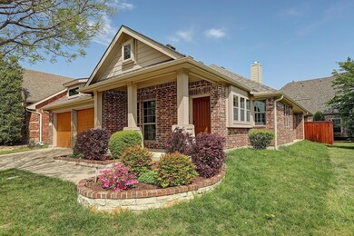 View of front of home featuring a garage and a fro