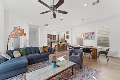 Bright and spacious living area with modern furnis
