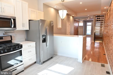 733 E 22nd St, Baltimore, MD 21218 - photo 2