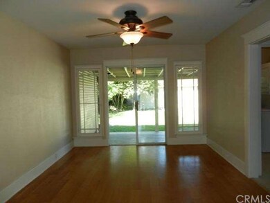 Spacious Formal Dining Room with Hardwood Floors