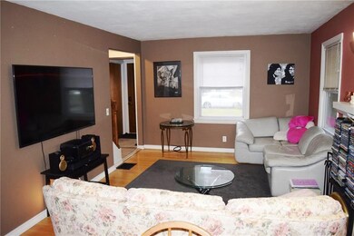Large living room with hardwood floors and lots of