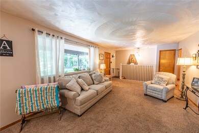 Stairwell directly off living room leads to the fi