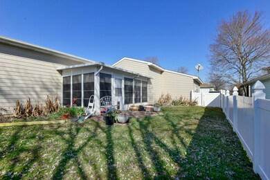 Vinyl fence and Sun Room