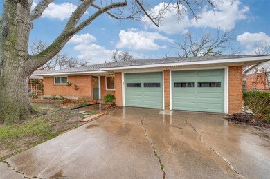 Single story home featuring a garage