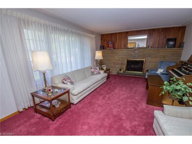 Living room with woodburning fireplace
