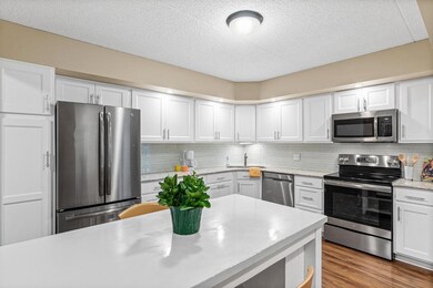 Tile backsplash and movable kitchen island