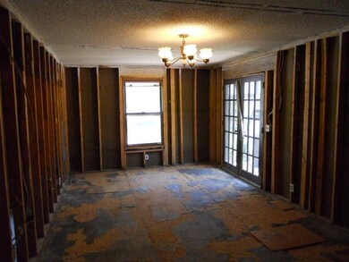 Office or hobby room.  French doors lead out to de