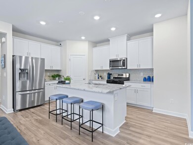 Photo is not of the actual home, but is an inspirational photo of builder’s model home.