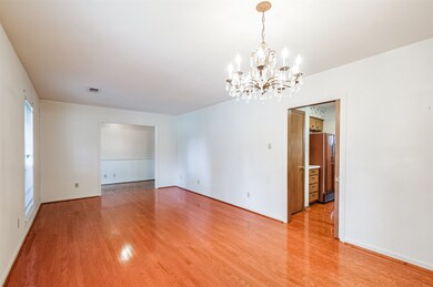 Formal living and dining areas with direct access to the kitchen