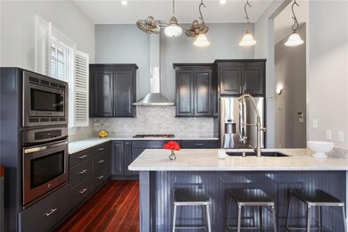 Open Kitchen with Marble Counter Tops