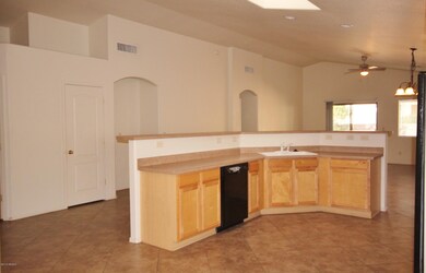 Kitchen with island breakfast bar