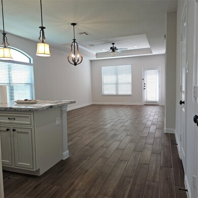 The majority of the flooring is tile with the wood