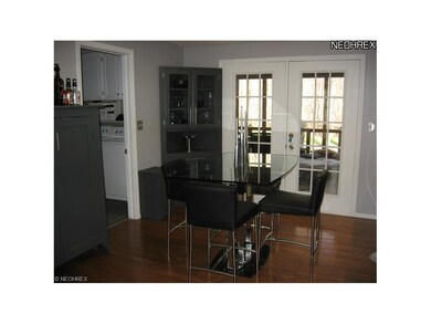The spacious eating area provides French Doors ope