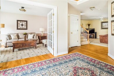 Living room area with wood floors
