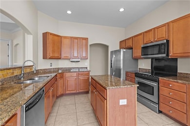Kitchen featuring sink, stainless steel appliances