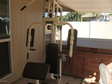 Patio with wt lifting set and hot tub