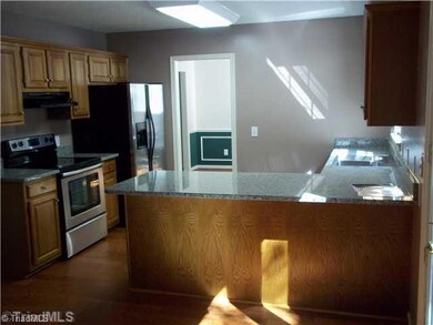 Breakfast. Breakfast room and kitchen has new hardwood floor. Brand new Granite Countertops!