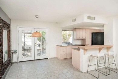 Kitchen and dining room lead to yard
