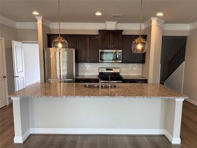 Kitchen with appliances with stainless steel finis