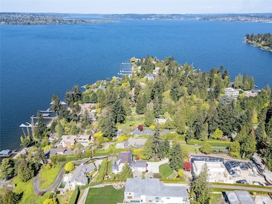 Perched at the top of Evergreen Point, this premier property delivers the rare blend of total privacy and effortless comfort.