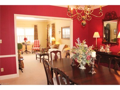 The living rooms leads to the formal dining room.
