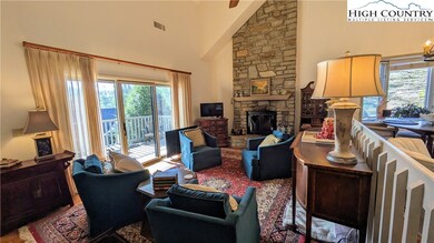 Living room area, access to patio