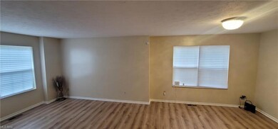 Living and dinning room with natural light.