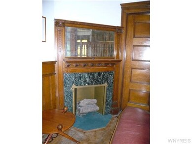 Other Fireplace in Foyer
