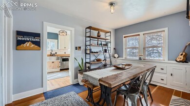 Dining room featuring dark hardwood / wood-style f