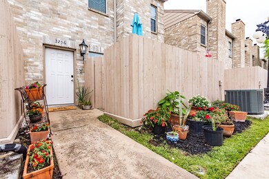 Warm and inviting entry at this corner unit with i