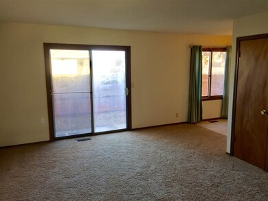 Main floor living room, sliding glass doors to bac