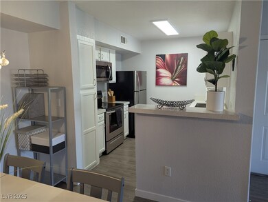 Kitchen with appliances with stainless steel finis