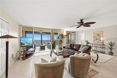 Living Area with sliding glass doors to the screened lanai